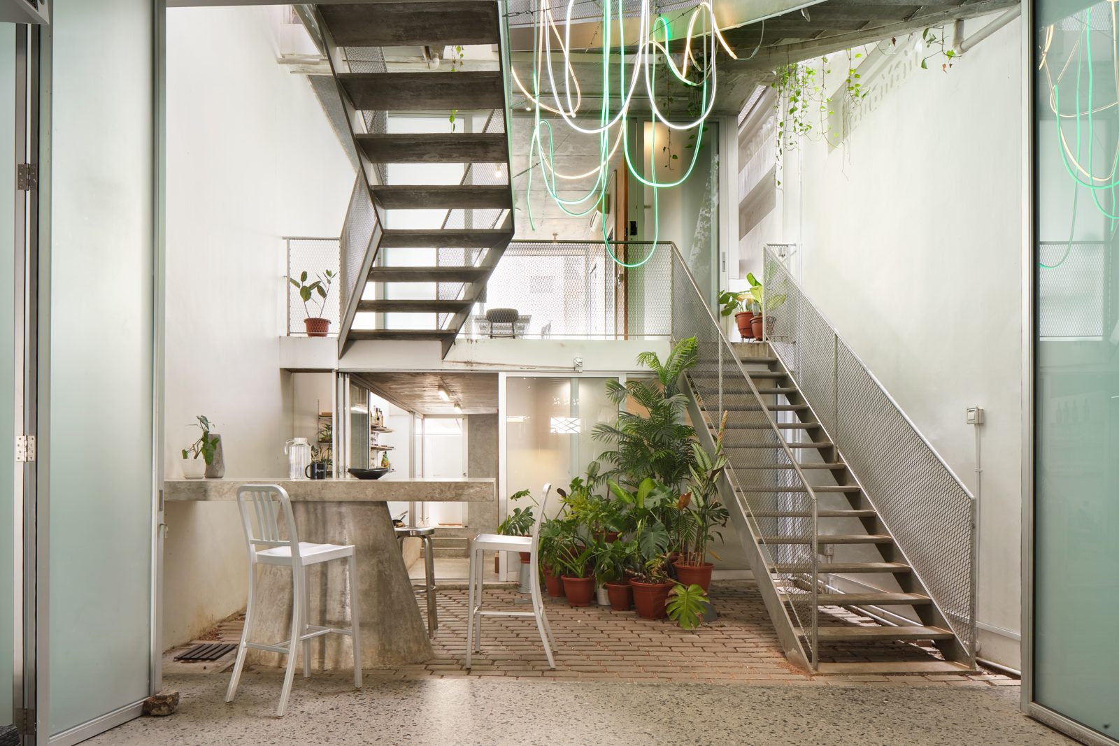 Existing courtyard and stairwell at Figment Club House